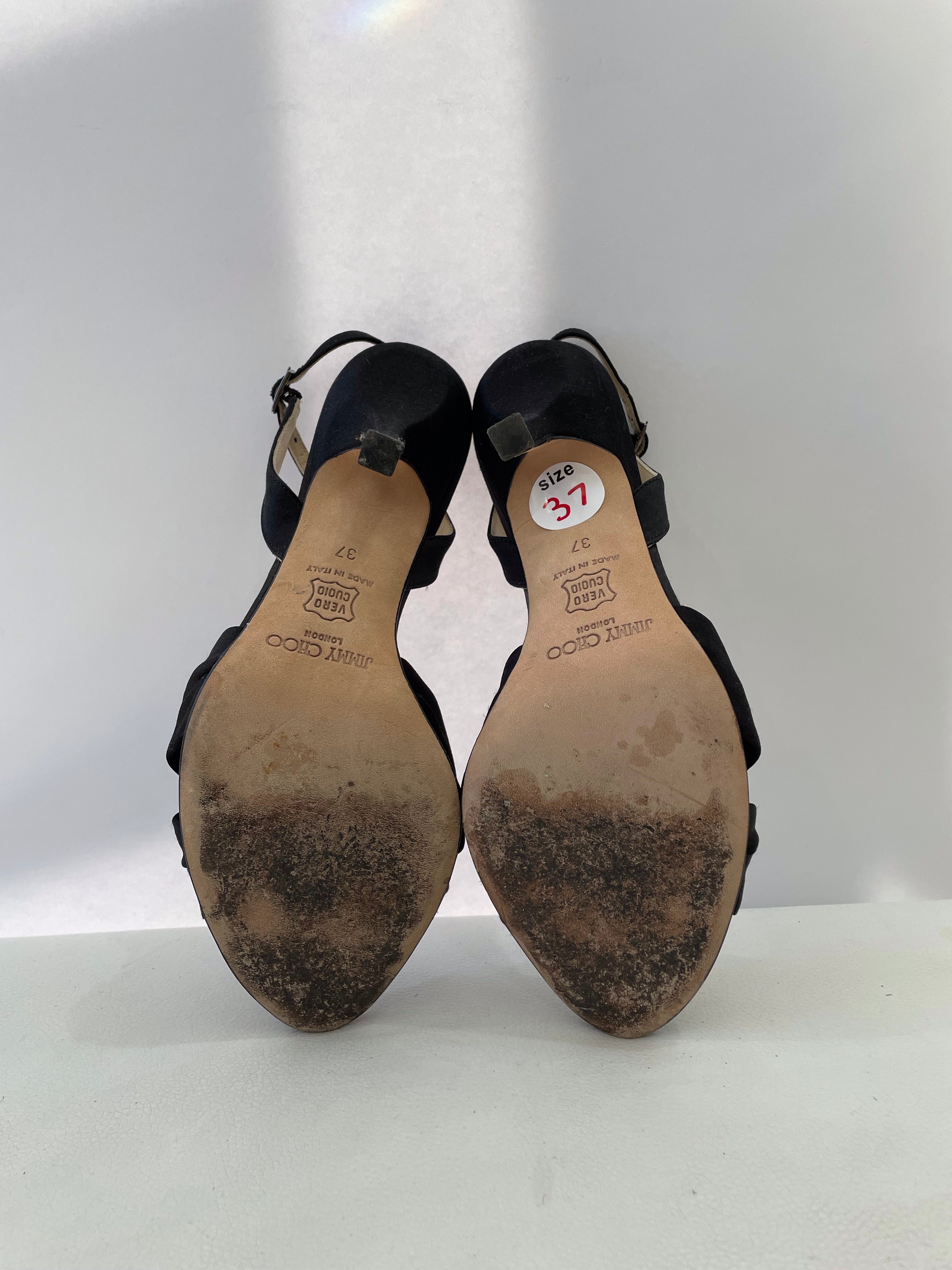Black Patent Leather Pointed-Toe Pumps with JC Emblem | LOVE